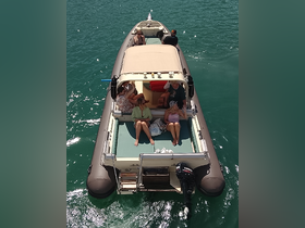 A group of friends relaxes on a boat, enjoying the sun and turquoise waters — perfect for a day of leisure on the water.