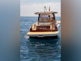 A couple enjoys a sunny day on the deck of a luxurious yacht, perfect for summer adventures on the water.