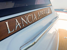 Close-up view of the elegant nameplate on a Lancia Aprea 42, showcasing the boat's stylish design and craftsmanship.