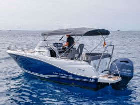 A sleek Cap Camarat speedboat cruising through clear waters, showcasing its modern design and functionality — perfect for day trips and water adventures.