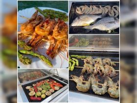 A delicious spread of grilled seafood and vegetables prepared on board, showcasing the culinary delights available during your boating experience.