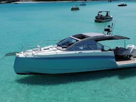 A sleek yacht glides through crystal-clear turquoise waters, showcasing its elegant design and perfect for luxury outings.