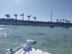 A vibrant scene featuring jet skis in action on clear waters, perfect for adventure seekers enjoying a day on the water.