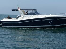 A sleek boat cruising through the water with two individuals on board, showcasing a perfect day for boating adventures.