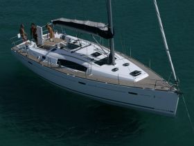 A group of friends enjoys a sailing adventure on a sleek yacht, showcasing the thrill of being on the water.