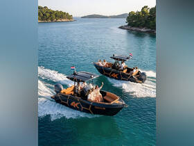 A lively group enjoys a fun day on the water, cruising in stylish boats amidst stunning scenery — perfect for group outings and celebrations.