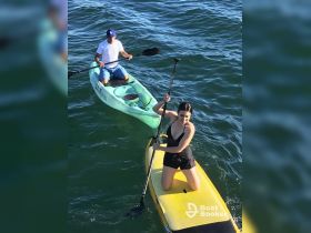 A fun day on the water with friends, featuring paddleboarding and kayaking — perfect for adventure seekers looking to enjoy the outdoors.