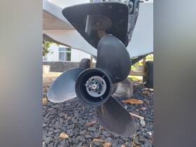 Close-up view of a boat propeller, showcasing its design and structure, ideal for understanding boat mechanics.