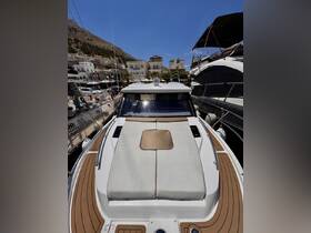 A well-appointed helm area of a boat, showcasing comfortable seating and a clean design, perfect for enjoying a day on the water.