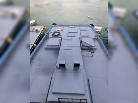 A top-down view of a boat deck showcasing its layout and features, ideal for understanding the space available for activities on board.