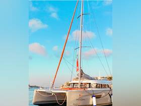 A stunning catamaran named 'Bossa Nova' docked in calm waters, showcasing its sleek design against a picturesque sky — perfect for luxury charters and sailing adventures.