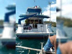 A view of the 'Area 51' boat docked in clear waters, showcasing its structure and design, perfect for private charters and tours.