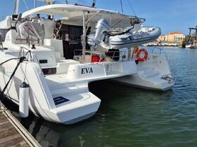 A sleek catamaran named 'EVA' docked at the marina, showcasing its modern design and spacious layout, perfect for leisurely cruises.