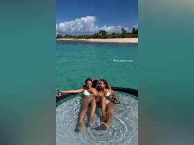 A fun group of friends enjoys a sunny day in the water, relaxing and swimming near a beautiful beach — perfect for memorable outings in Puerto Rico.