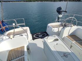 A well-equipped helm area of a boat, showcasing the seating and console, perfect for navigating the open waters.