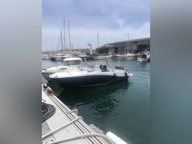 A sleek speedboat docked in a marina, surrounded by other vessels, showcasing the perfect spot for a day on the water.