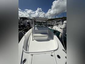 A clean and spacious helm area of a boat, featuring comfortable seating and a clear view, perfect for navigating the waters.