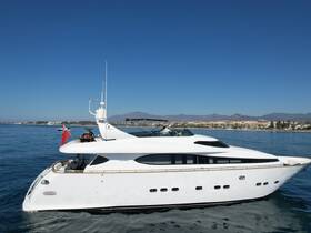 A stunning side view of a luxurious yacht docked in calm waters, showcasing its elegant design and spacious layout, perfect for upscale boating experiences.
