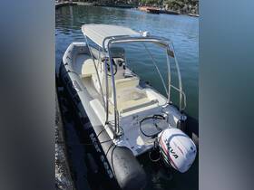 A sleek speedboat docked at the marina, showcasing its modern design and spacious seating — perfect for day trips on the water.