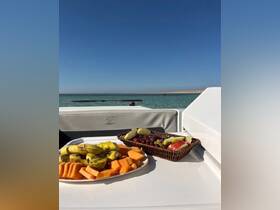 A vibrant display of fresh fruit snacks onboard a boat, perfect for enjoying while cruising on the water.