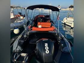 A detailed view of the interior helm of a sleek boat, showcasing the seating and console area, perfect for navigating the open waters.