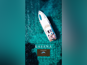 A stunning aerial view of the Kasana yacht cruising through crystal-clear waters, showcasing the perfect setting for a luxurious boating experience.