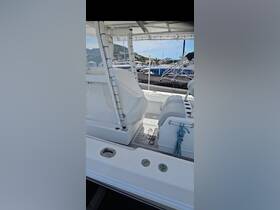 Interior view of a boat's helm and seating area, showcasing a clean and spacious design ideal for comfortable cruising.