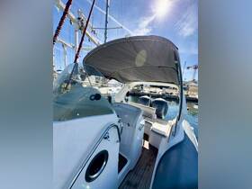 A well-appointed helm area of a boat, showcasing the console and seating, perfect for navigating the open waters.
