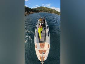 A lively group enjoys their time aboard a boat, showcasing the fun and camaraderie of on-water adventures in a scenic setting.