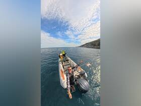 A joyful group enjoys a day on the water, celebrating aboard a boat with stunning ocean views — perfect for adventure seekers and fun-loving friends.