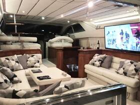 Luxurious interior of a yacht featuring comfortable seating and modern amenities, perfect for relaxing and entertaining while on the water.