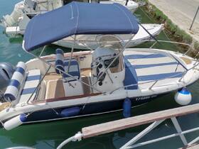 A well-appointed interior view of a boat showcasing comfortable seating and a helm, perfect for leisurely outings on the water.