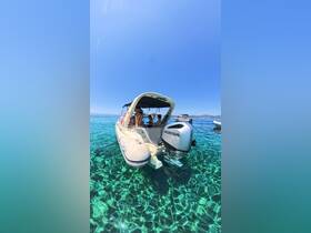A group enjoys a sunny day on a boat, surrounded by crystal-clear waters — perfect for summer adventures and water activities.
