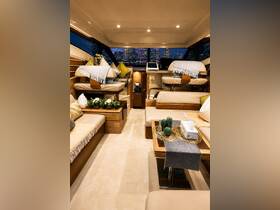 A beautifully designed interior of a luxury yacht, showcasing comfortable seating and elegant decor, perfect for relaxing and entertaining on the water.