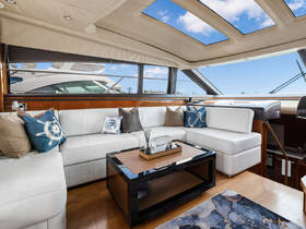 A beautifully designed interior lounge area of a yacht featuring comfortable seating and stylish decor, perfect for relaxation while cruising.