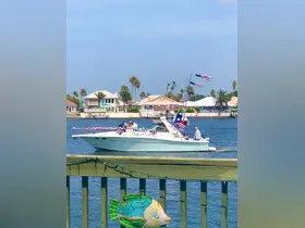 A festive boat cruise featuring families enjoying time on the water, adorned with patriotic decorations — perfect for summer celebrations in Texas.