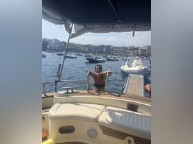 A child enjoys a sunny day on a boat in the harbor, showcasing the fun of summer adventures on the water.