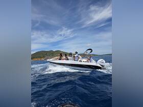 A lively group enjoys a thrilling ride on a speedboat, showcasing the excitement of on-water activities in a picturesque setting.