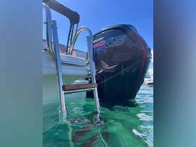 A close-up view of a boat's ladder and motor, showcasing essential amenities for water activities. Perfect for those looking to explore the waters with ease.
