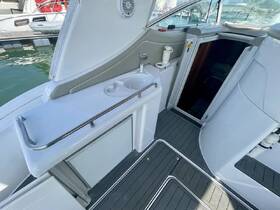 Interior view of a boat's helm area, showcasing the sleek design and functional layout, perfect for navigating the waters in style.