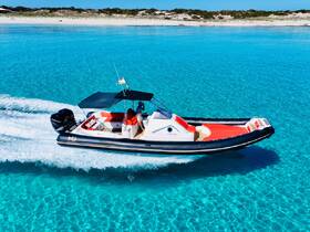 A sleek speedboat glides through crystal-clear waters, showcasing its vibrant design and perfect for thrilling adventures on the open sea.