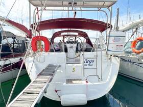 A clear view of the back of a yacht named 'Virgo' docked at the marina, showcasing its elegant design and features.