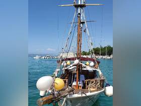 A beautifully decorated yacht docked in calm waters, showcasing its elegant structure and inviting atmosphere, perfect for leisurely cruises.