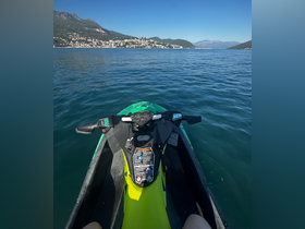 A thrilling view from a jet ski, showcasing the stunning coastal scenery and clear waters — perfect for adventure seekers enjoying water sports.