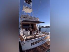 A stunning view of the 'Prenuptial Agreement' yacht docked in San Diego, showcasing its elegant design and inviting atmosphere.