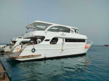 Shared Boat to Orange Bay Island & Snorkeling