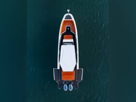 A stunning aerial view of a sleek yacht showcasing its elegant design and spacious deck, perfect for luxury cruising on the water.