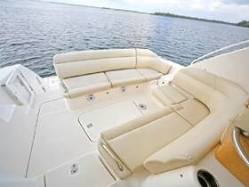 A spacious and inviting seating area inside a boat, perfect for relaxation and enjoying the views while cruising on the water.