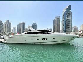 A sleek yacht docked in a vibrant marina, surrounded by stunning skyscrapers — an ideal setting for luxury boating experiences.