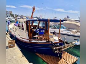 A beautifully docked boat showcasing its elegant design and inviting deck space, perfect for leisurely outings on the water.